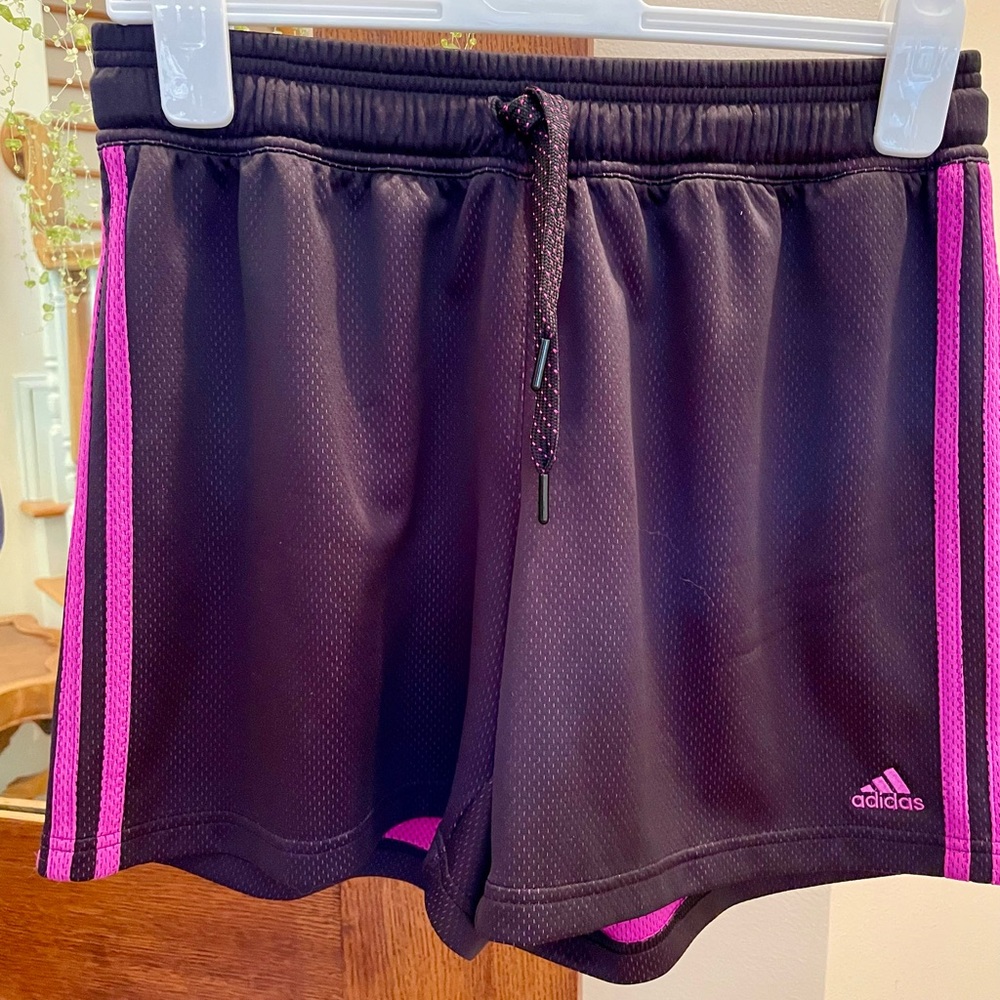 Adidas knit shorts in black mesh with deep pink lining and stripes.